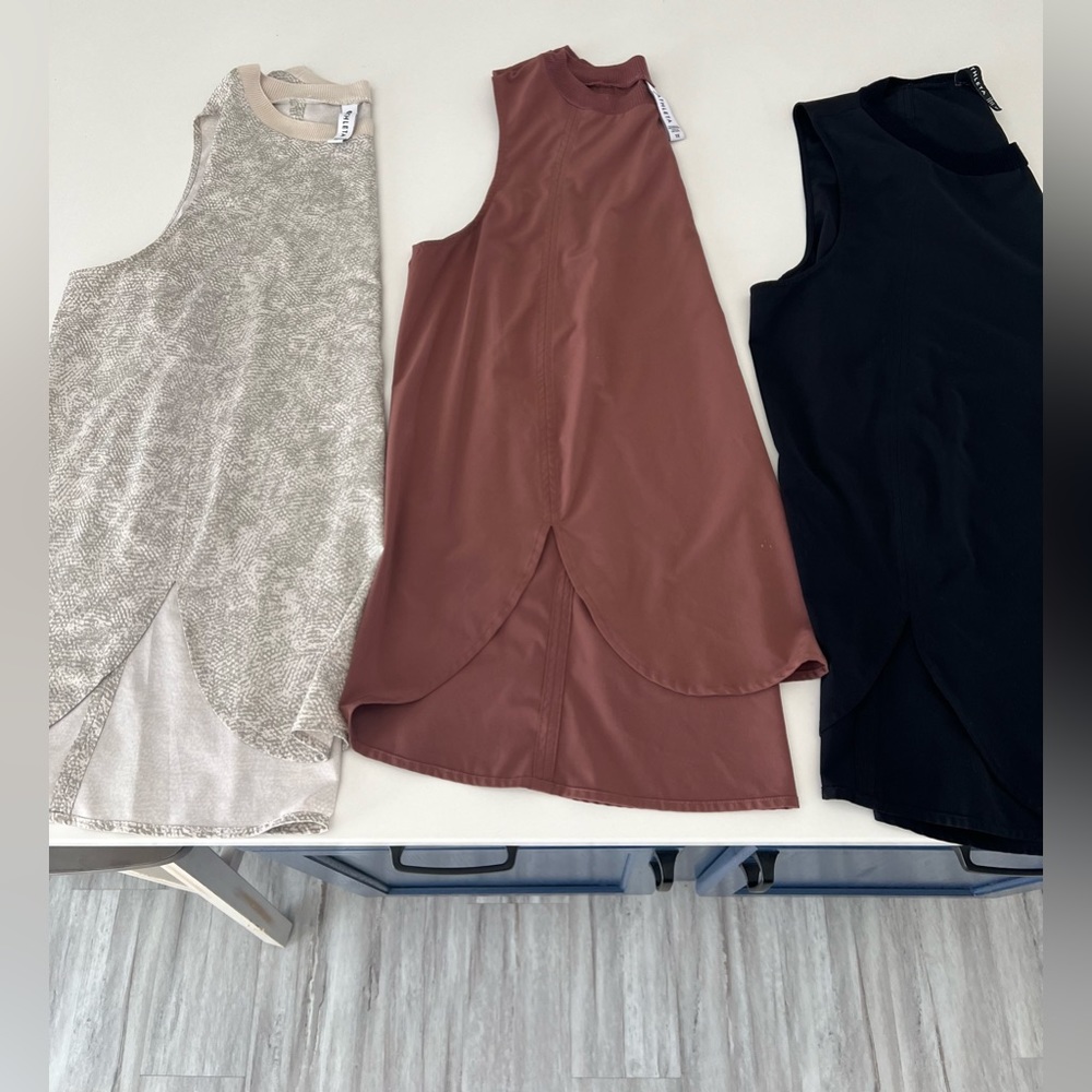 Athena sleeveless zephyr style tank . 3 colors same style and size . 1x